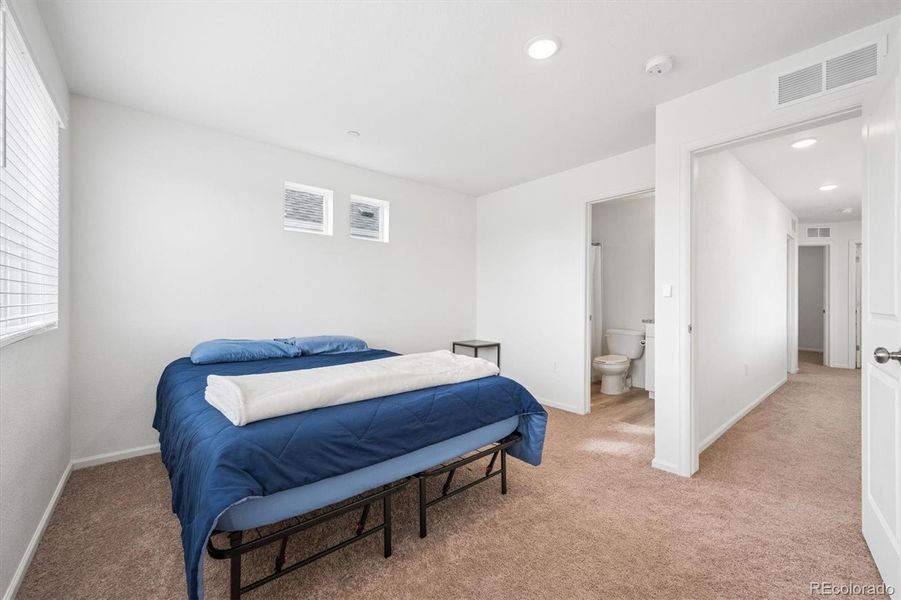 Furnished interior view inside a new home in Reunion, Commerce City (Image 11).