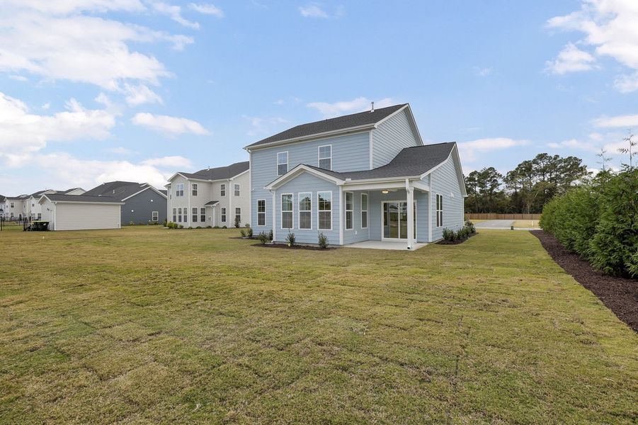 Exterior details and patio area of a home in East Wynd, Hampstead (Image 18).