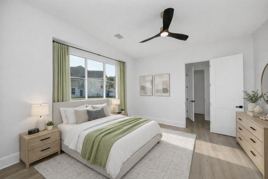 Secondary bedroom that faces sideyard and has private entry to shared bathroom. Secondary bedroom that faces sideyard and has private entry to shared bathroom.