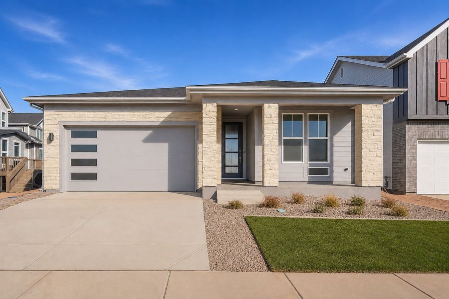 Front exterior of a new home in Sterling Ranch Ascent Village, Littleton, CO, highlighting curb appeal (Image 1). Front exterior of a new home in Sterling Ranch Ascent Village, Littleton, CO, highlighting curb appeal (Image 1).