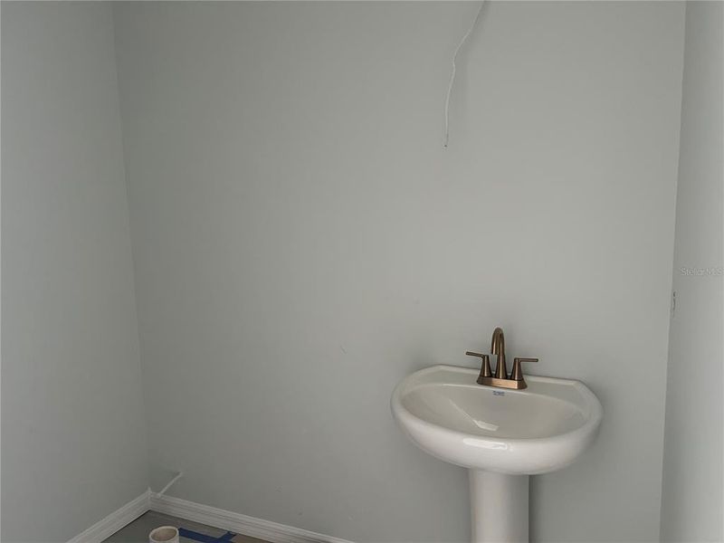 In-progress construction of a new home in Oakfield Trails Signature, Parrish, FL (Image 20).