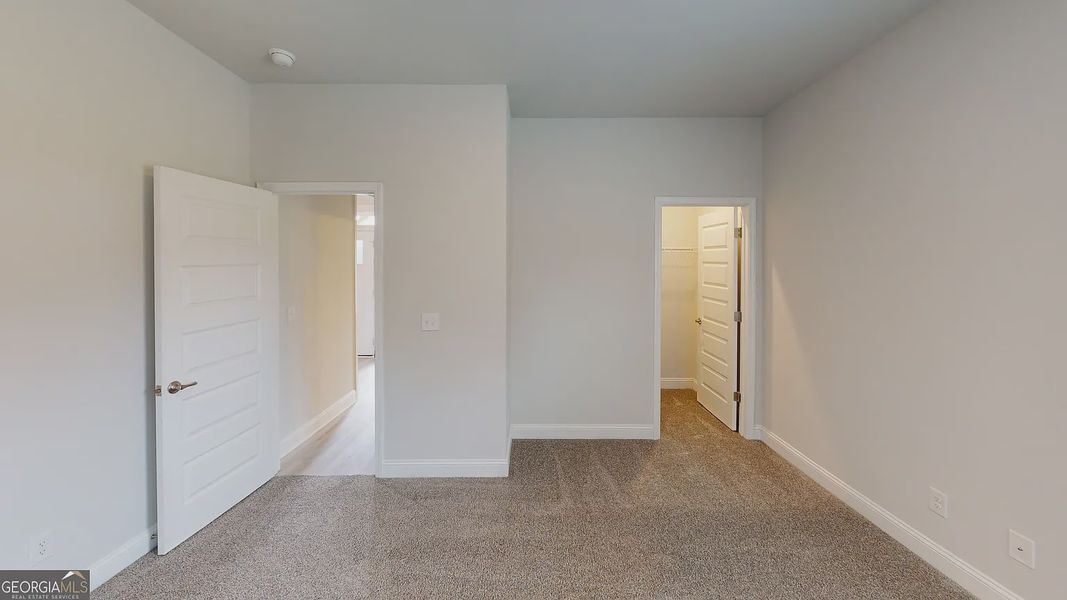 Spacious, unfurnished interior of a new home in Holliday Pass, Griffin (Image 27).