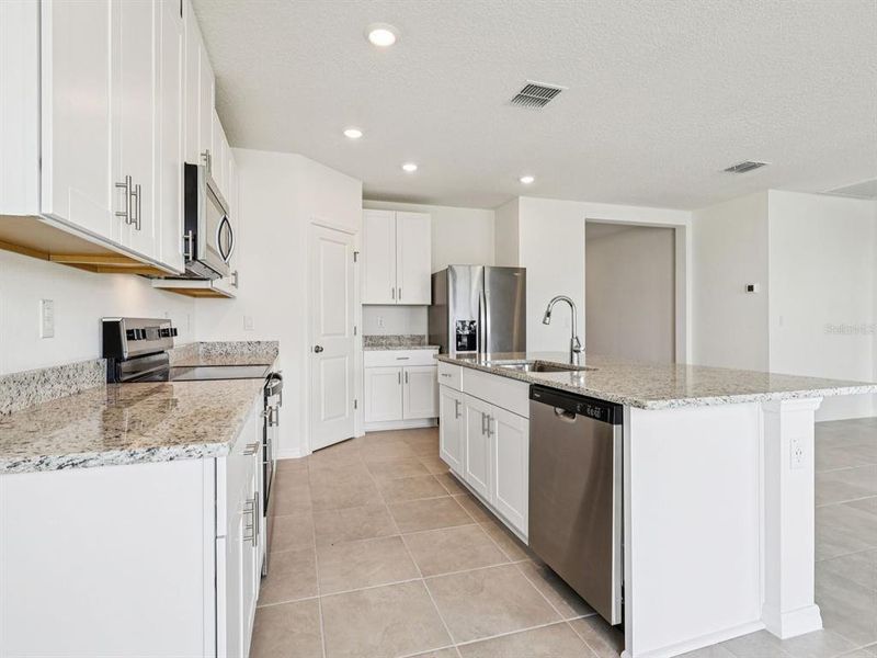 Furnished interior view inside a new home in Benton Hills - Classic Series, Brooksville (Image 4).