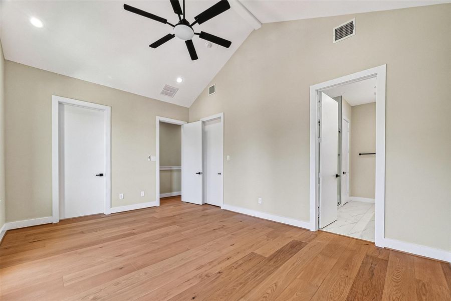Incredible primary suite featuring high-end finishes and two walk-in closets with custom built-ins. Incredible primary suite featuring high-end finishes and two walk-in closets with custom built-ins.