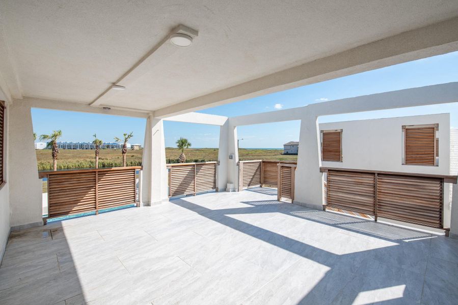 Exterior details and patio area of a home in , Port Aransas (Image 20).