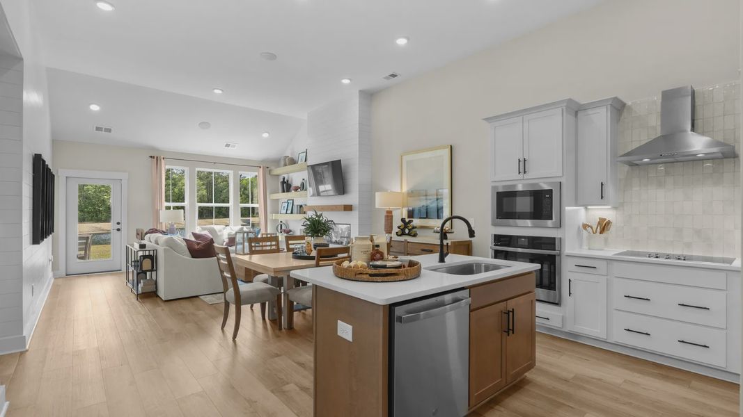 The Summit features open-concept living with a spacious kitchen and gathering area.