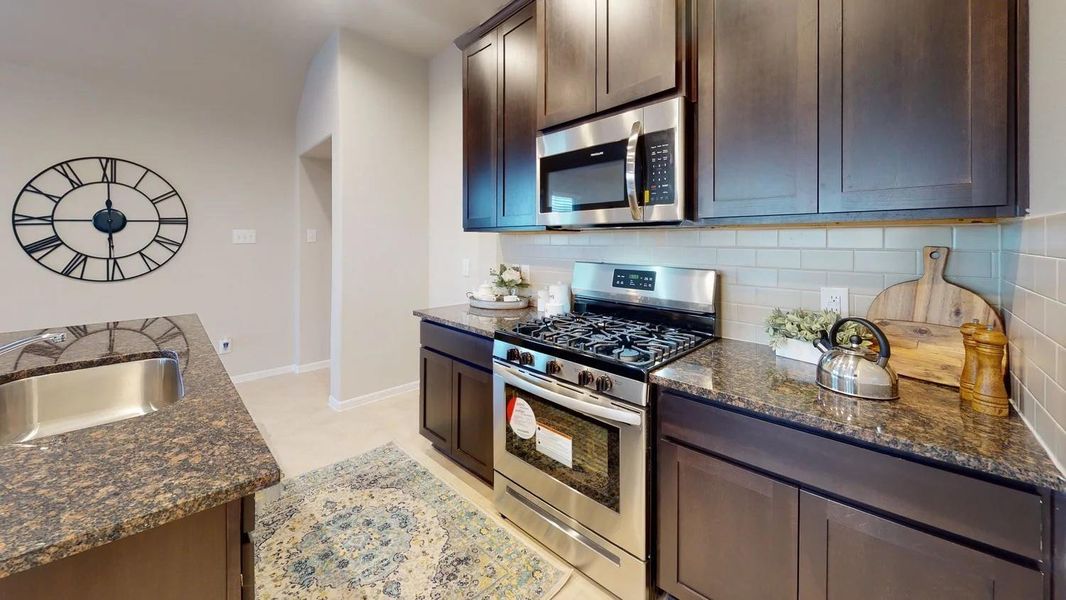 Furnished interior view inside a new home in Sunterra, Katy (Image 11).