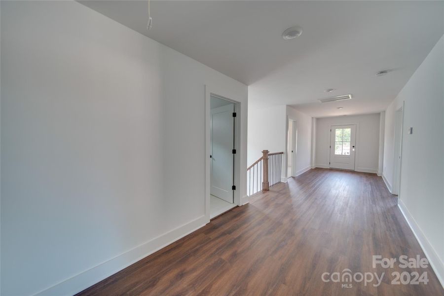 HALLWAY TO 2ND FLOOR PORCH