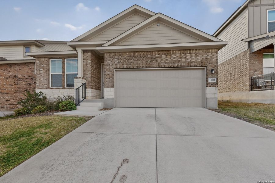 Front exterior of a new home in Bricewood, San Antonio, TX, highlighting curb appeal (Image 18). Front exterior of a new home in Bricewood, San Antonio, TX, highlighting curb appeal (Image 18).