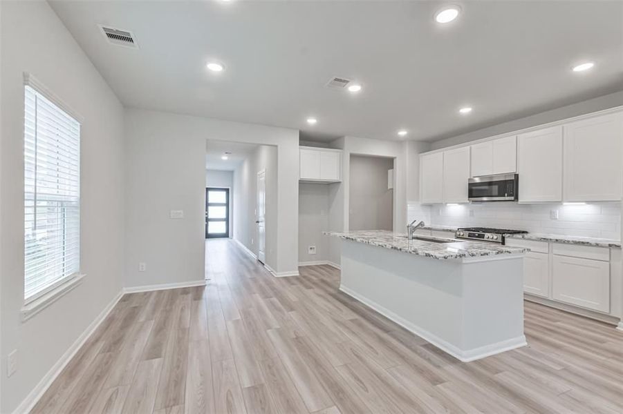 Furnished interior view inside a new home in Lakes at Black Oak, Magnolia (Image 48).