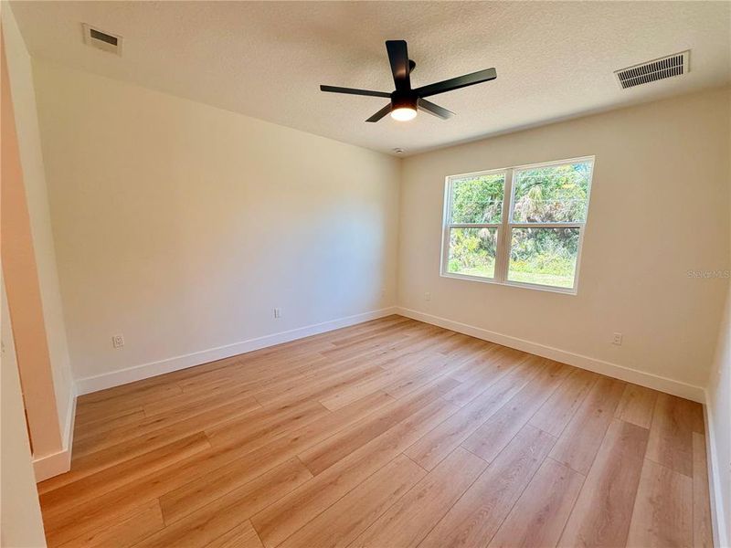 Spacious, unfurnished interior of a new home in , Port Charlotte (Image 51).