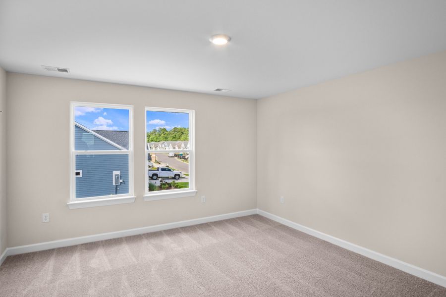 Spacious, unfurnished interior of a new home in Coastal Club of the Carolinas, Calabash (Image 24).