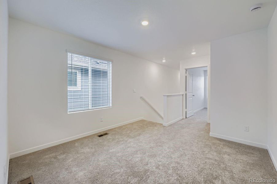 Spacious, unfurnished interior of a new home in Copper Chase: The Celestial Collection, Colorado Springs (Image 7).