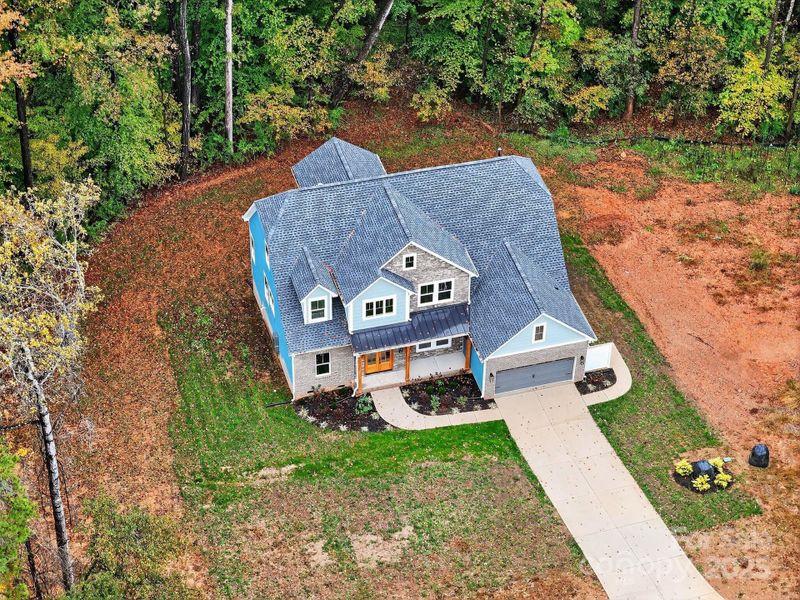 Front exterior of a new home in , Belmont, NC, highlighting curb appeal (Image 2).