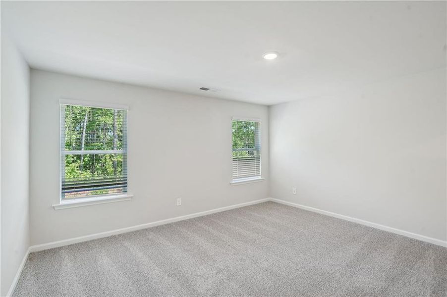 Spacious, unfurnished interior of a new home in Avalon - Parc Series, Conyers (Image 11). Spacious, unfurnished interior of a new home in Avalon - Parc Series, Conyers (Image 11).