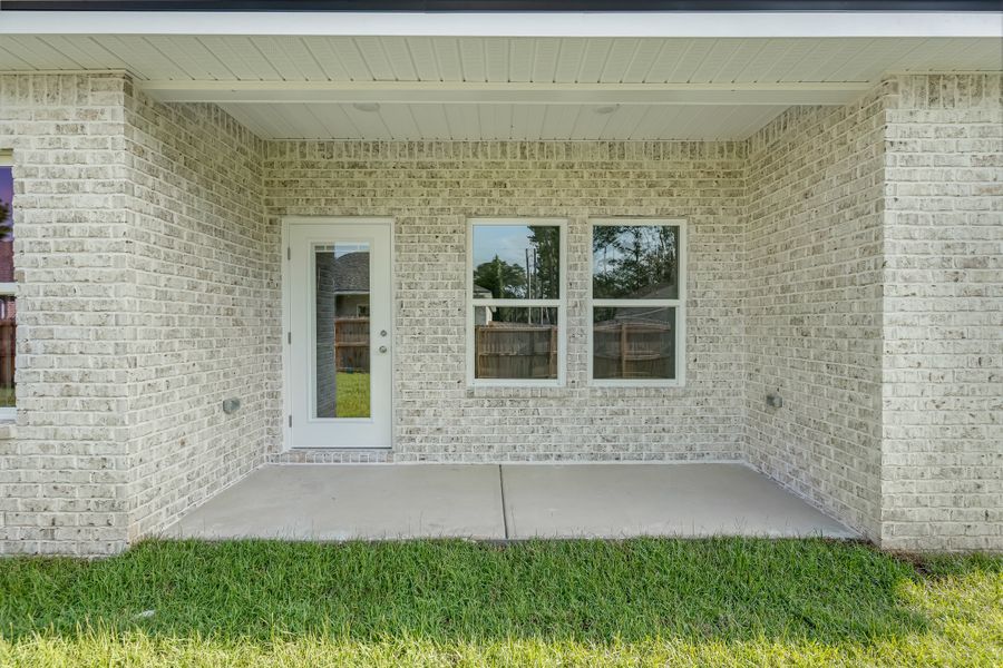 Exterior details and patio area of a home in Southern Day Chateau, Baker (Image 3).