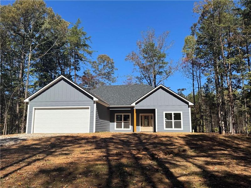 Front exterior of a new home in , Dawsonville, GA, highlighting curb appeal (Image 1). Front exterior of a new home in , Dawsonville, GA, highlighting curb appeal (Image 1).