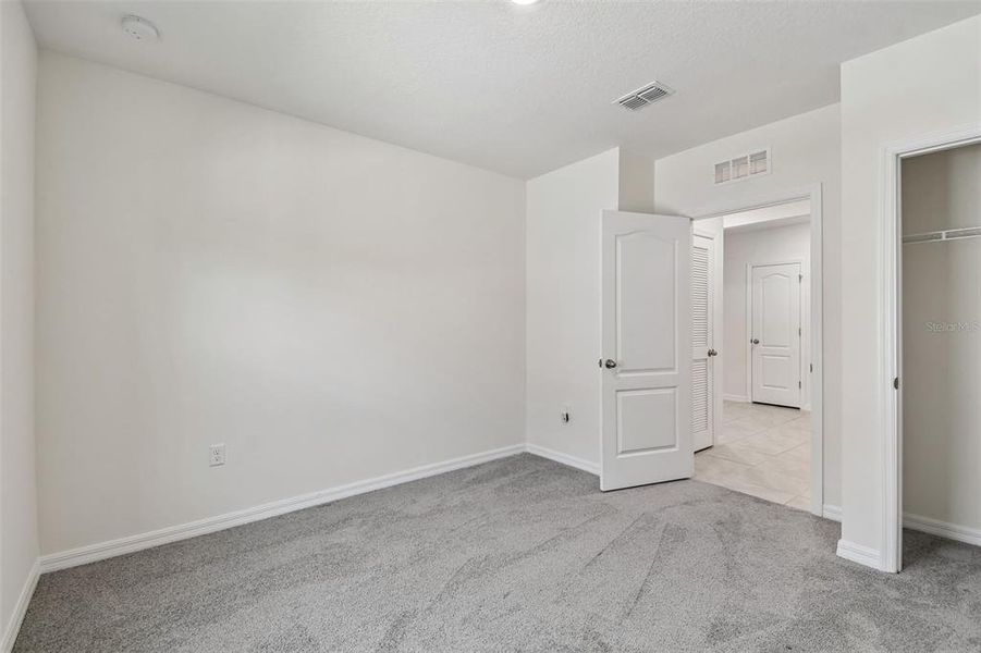 Spacious, unfurnished interior of a new home in Riviera Bella, Debary (Image 44).