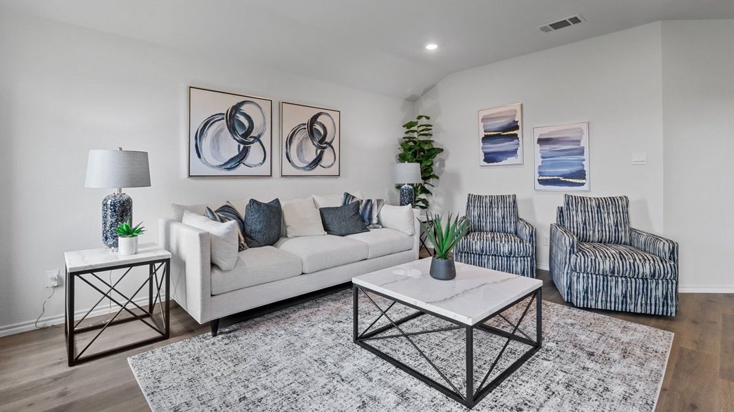 Representative furnished interior of a home built from the X40T Travis by D.R. Horton in Valor Farms, Royse City (Image 9).