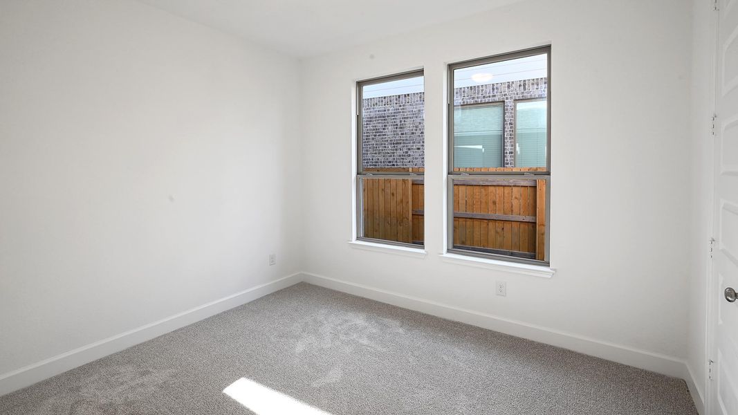 Spacious, unfurnished interior of a new home in 6 Creeks 50', Kyle (Image 15).