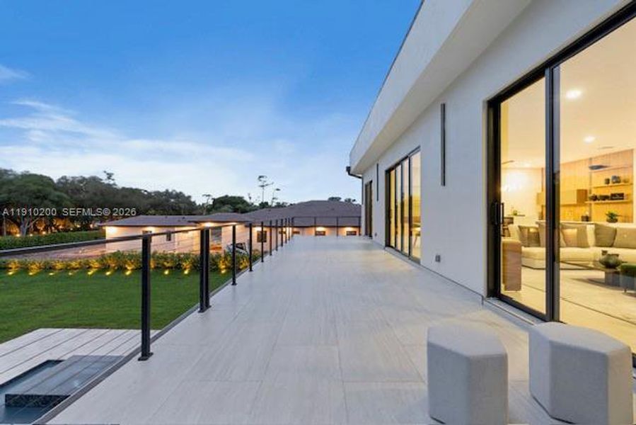 Exterior details and patio area of a home in , Parkland (Image 28).