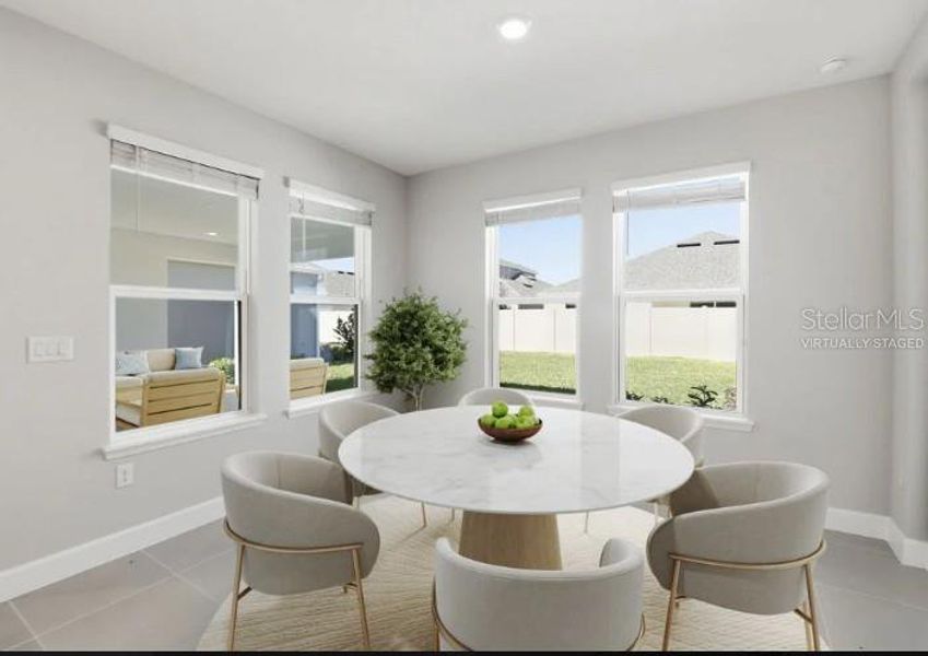 Furnished interior view inside a new home in Harvest at Ovation, Winter Garden (Image 3).