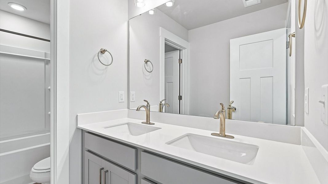 Well-appointed full bath with high standards of craftsmanship and everyday function Well-appointed full bath with high standards of craftsmanship and everyday function