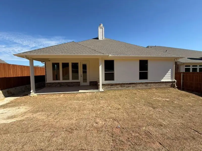 Exterior details and patio area of a home in Waterford Park, Weatherford (Image 3). Exterior details and patio area of a home in Waterford Park, Weatherford (Image 3).