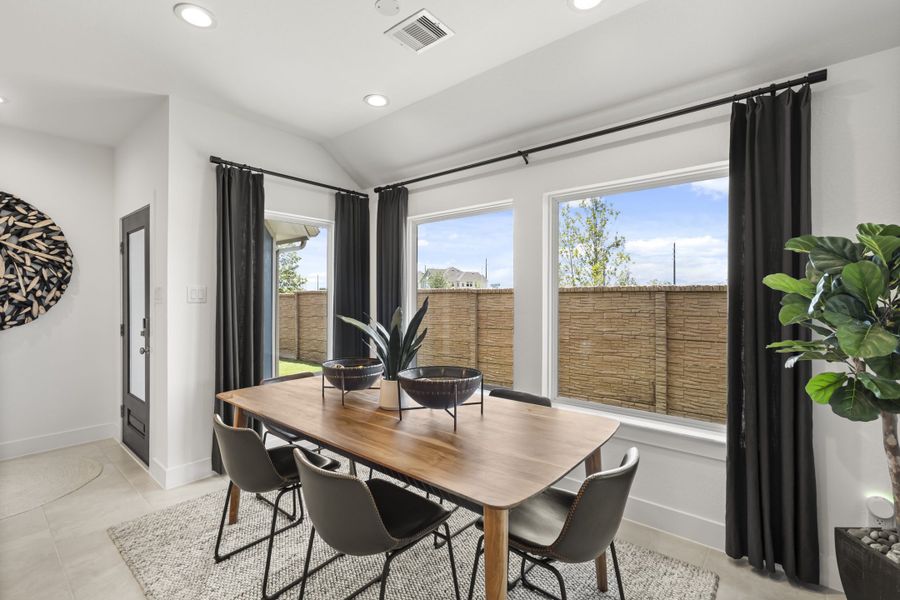 Furnished interior view inside a new home in Meridiana, Manvel (Image 13).