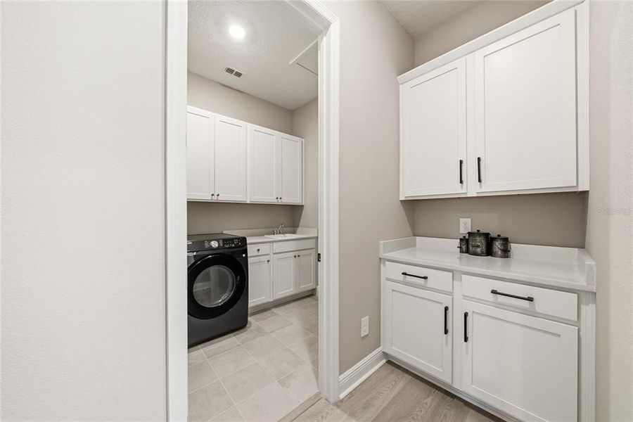 Furnished interior view inside a new home in Silverleaf Reserve, Winter Garden (Image 28).