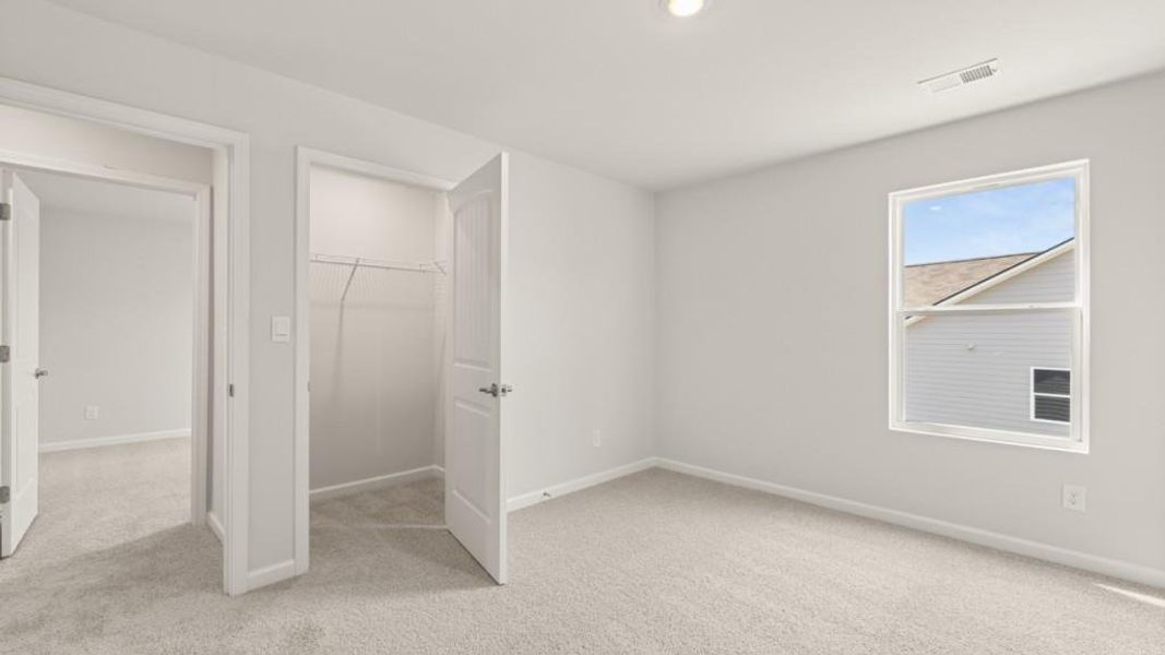 Spacious, unfurnished interior of a new home in Fairway 17 at Mirror Lake, Villa Rica (Image 22).