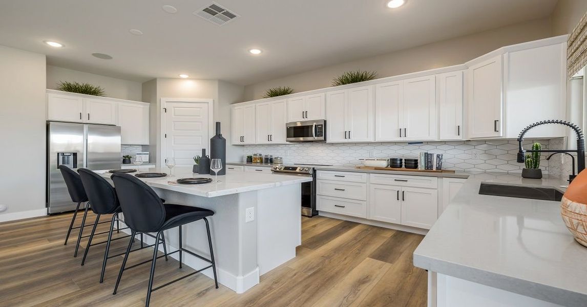 Representative furnished interior of a home built from the Camelback by William Ryan Homes in Alta Vida at Westpark, Buckeye (Image 11).