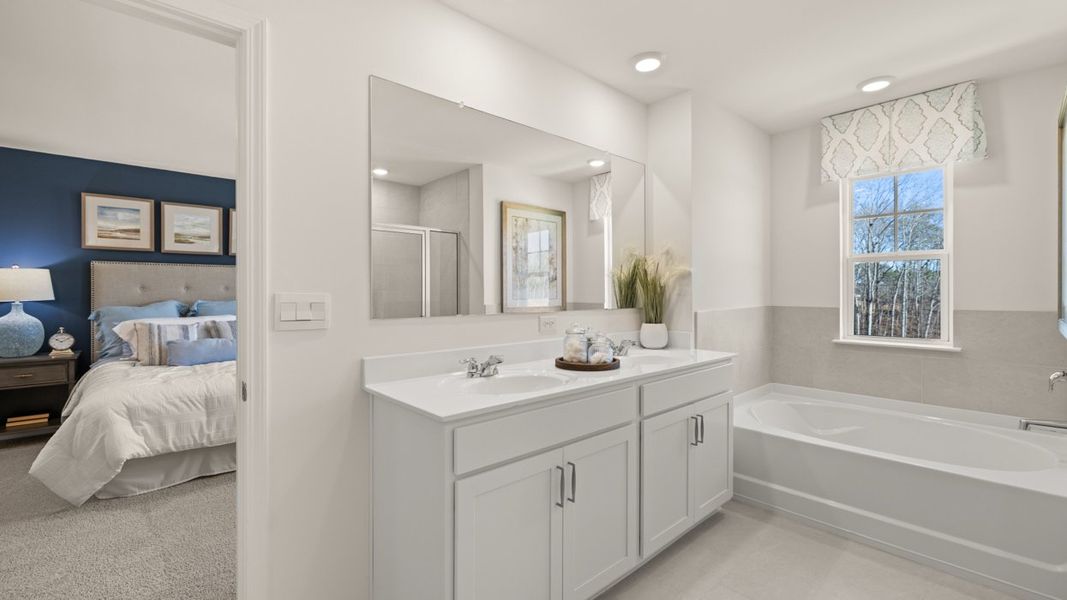 Representative furnished interior of a home built from the Hayden by D.R. Horton in Champion's Run, Lithonia (Image 11).