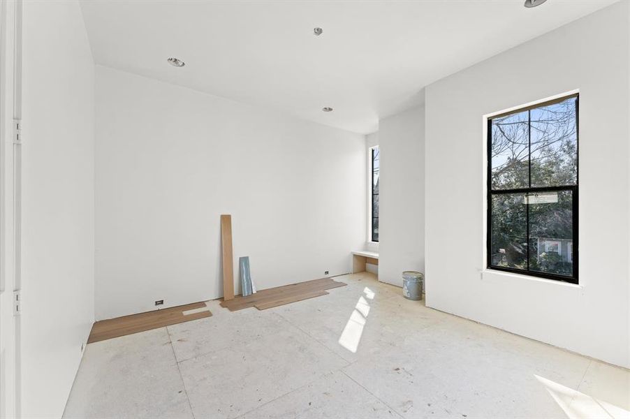 Additional upstairs bedroom with window seat to enjoy the view of 24th Street.