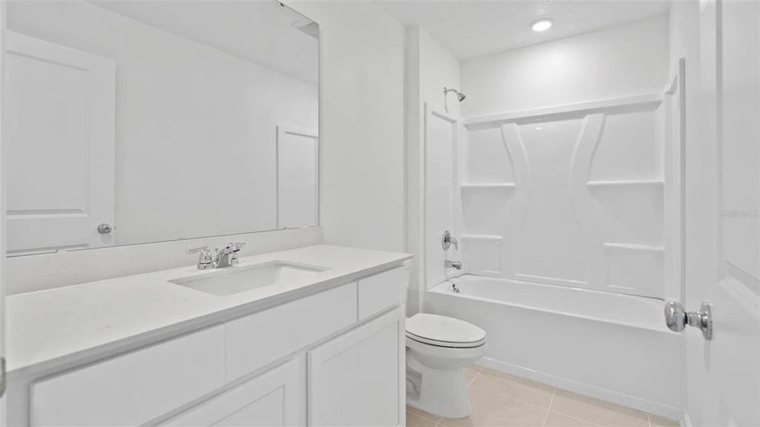 Furnished interior view inside a new home in Peace Creek Reserve: Manor Key Collection, Winter Haven (Image 3).