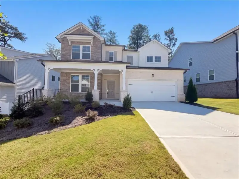 Front exterior of a new home in Bailey Fence, Dacula, GA, highlighting curb appeal (Image 1). Front exterior of a new home in Bailey Fence, Dacula, GA, highlighting curb appeal (Image 1).