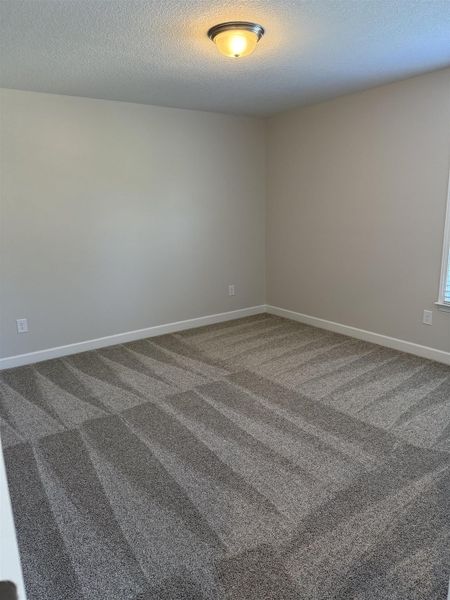 Spacious, unfurnished interior of a new home in Fall Creek, Inman (Image 7).