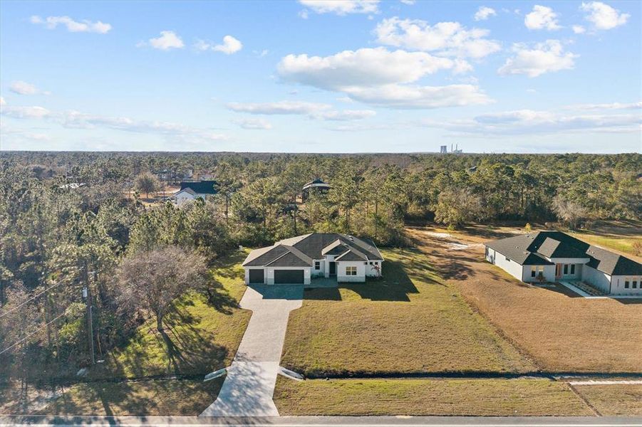 Front exterior of a new home in , Orlando, FL, highlighting curb appeal (Image 25).