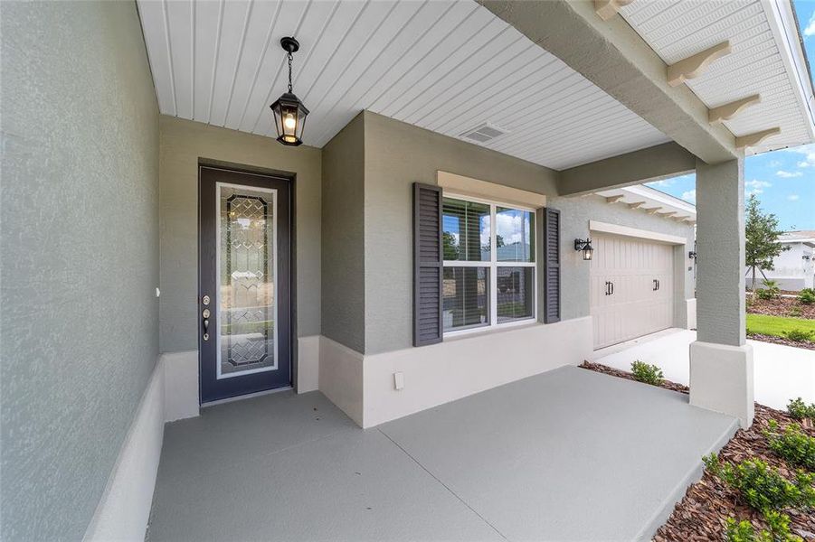 Exterior details and patio area of a home in On Top of the World Communities, Ocala (Image 23).