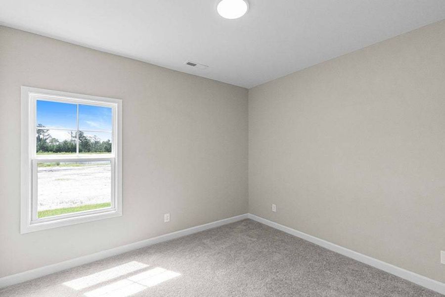 Representative unfurnished interior of a home built from the Pamlico by Caviness & Cates Communities in Bartlett Manor, Youngsville (Image 57).