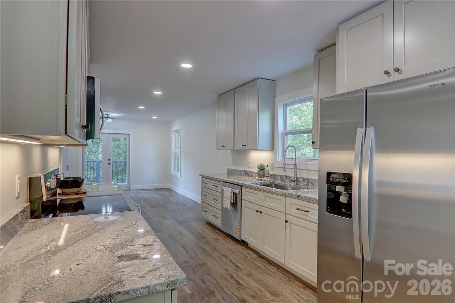 Furnished interior view inside a new home in , Waynesville (Image 14).