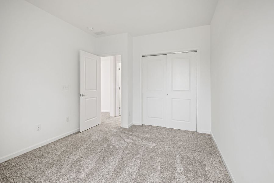 Spacious, unfurnished interior of a new home in Bryton, Huntersville (Image 37).