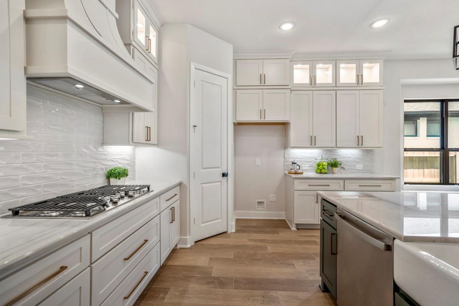 Furnished interior view inside a new home in ARTAVIA, Conroe (Image 19).