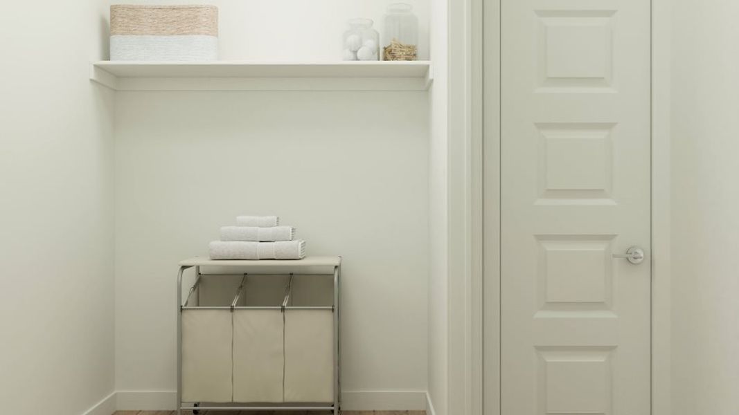 Laundry room with shelving