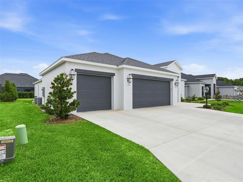 Front exterior of a new home in , The Villages, FL, highlighting curb appeal (Image 27). Front exterior of a new home in , The Villages, FL, highlighting curb appeal (Image 27).
