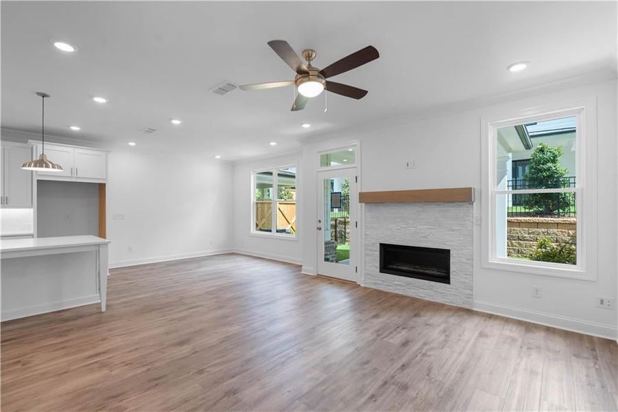 All open concept living - Pictures represent a previously built home