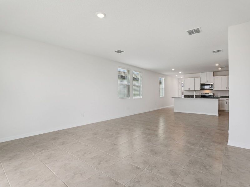 Spacious, unfurnished interior of a new home in The Reserve at Hammock Oaks - Classic Series, Lady Lake (Image 8).