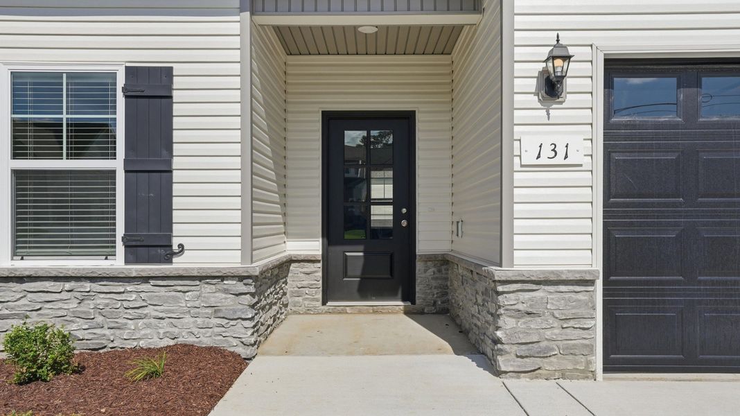 Exterior details and patio area of a home in Wheatfield, Shelbyville (Image 3).