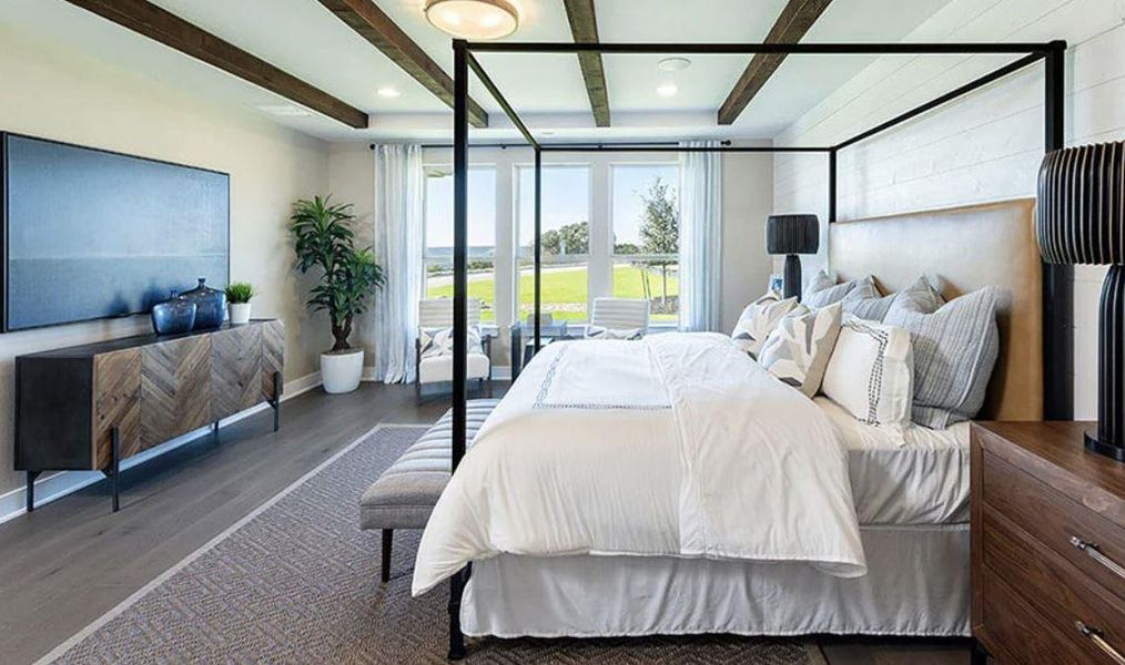 Bedroom featuring baseboards, wood finished floors, beam ceiling, and recessed lighting Bedroom featuring baseboards, wood finished floors, beam ceiling, and recessed lighting