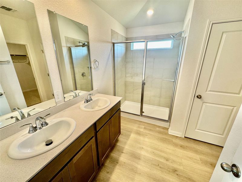 Furnished interior view inside a new home in Riverbend at Double Eagle - Reserve Collection, Cedar Creek (Image 9).